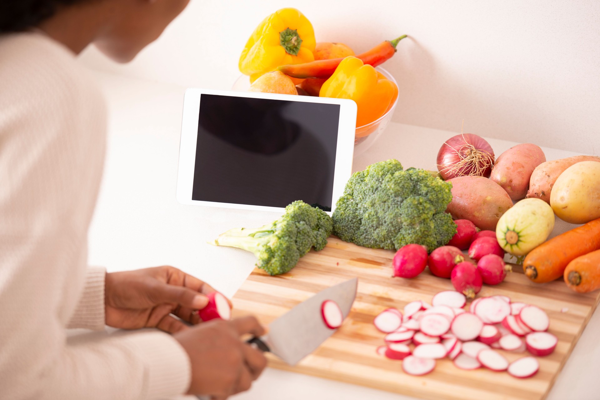 Woman cooking healthy dish.